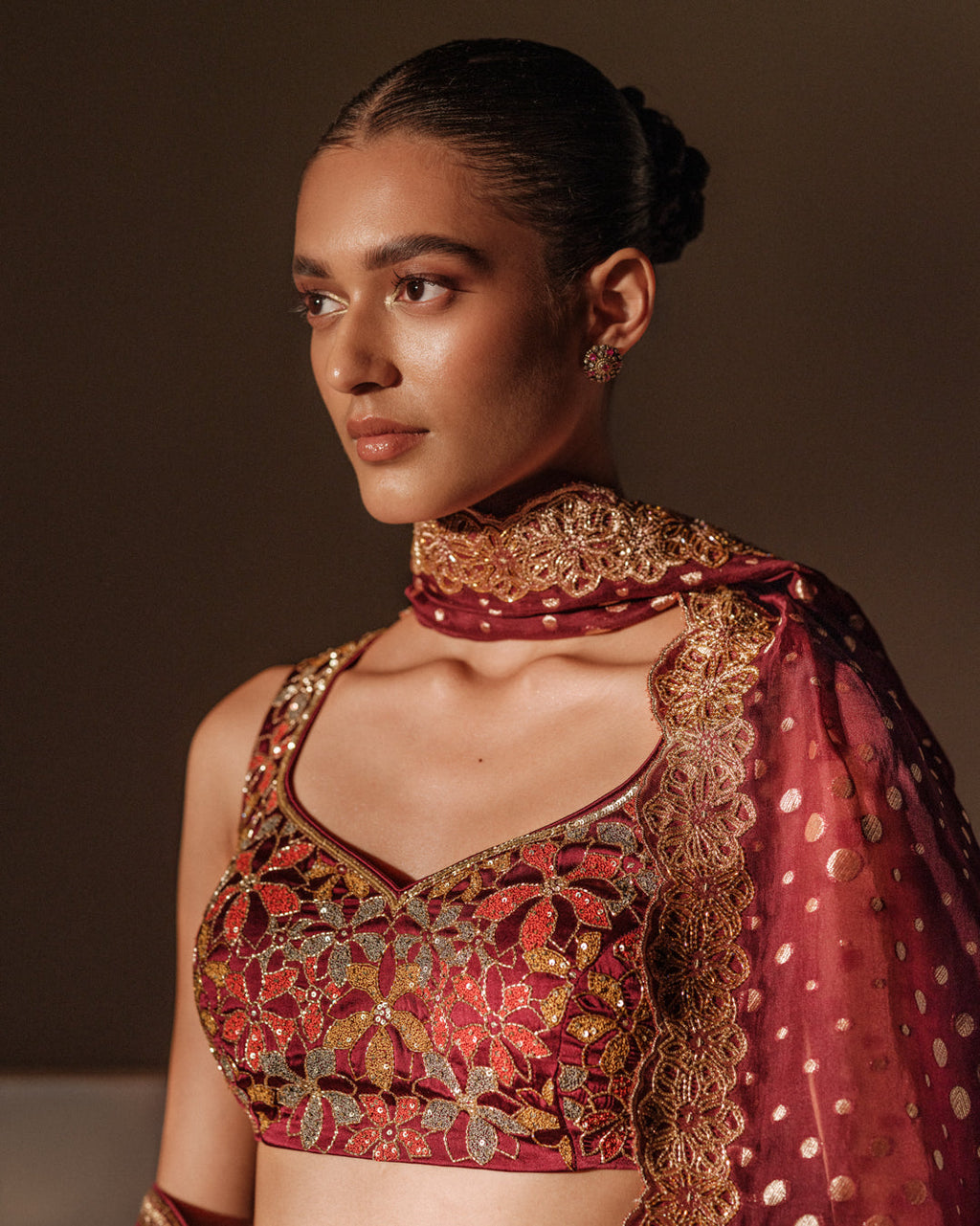 Maroon Grace Banarasi Lehenga Featuring Zardozi Butas